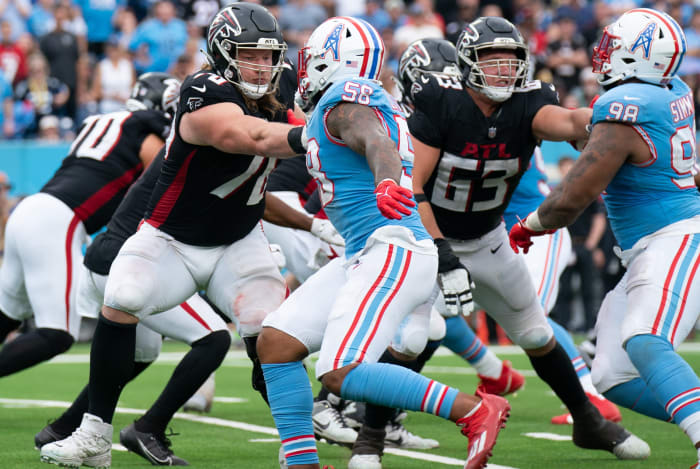 Atlanta Falcons offensive tackle Kaleb McGary (76) tries to hold off Tennessee Titans linebacker Harold Landry III (58) in the fourth quarter at Nissan Stadium in Nashville, Tenn., Sunday, Oct. 29, 2023. Chris Lindstrom.
